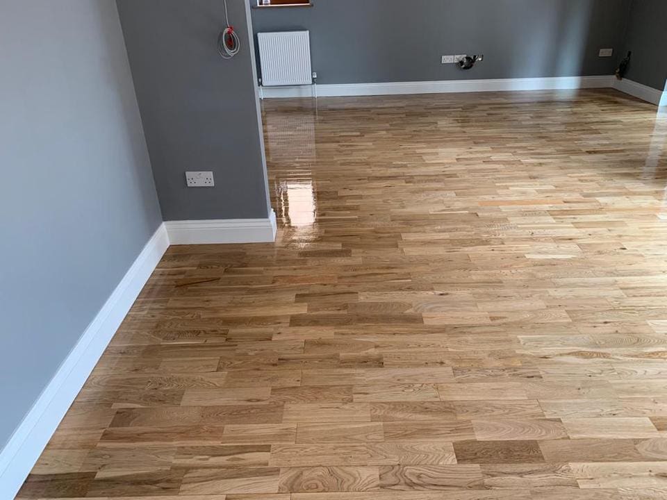135e917c-2e58-4b83-9fd9-9f99336773b3 Image showcasing a wood floor restoration in Colchester Essex