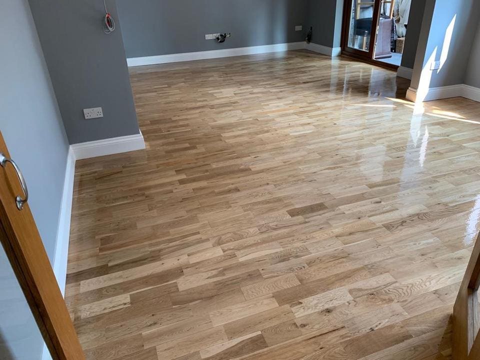 b44ad00a-37d4-486d-ab79-e8595780cd9b Image showcasing a wood floor restoration in Colchester Essex